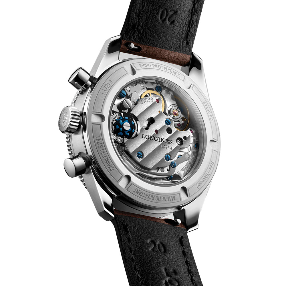Rear view of Longines Spirit Pilot Flyback with exhibition caseback revealing the movement and blue screws on a black leather strap.