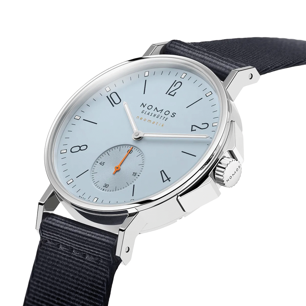Nomos Ahoi Neomatik Sky 36mm front view with light blue dial and navy fabric strap.