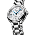 Close-up of a Longines Primaluna dial with blue hands and diamond markers on a white mother-of-pearl face