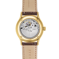 Gold Berlin automatic watch back with transparent caseback showing movement and a sepia leather strap