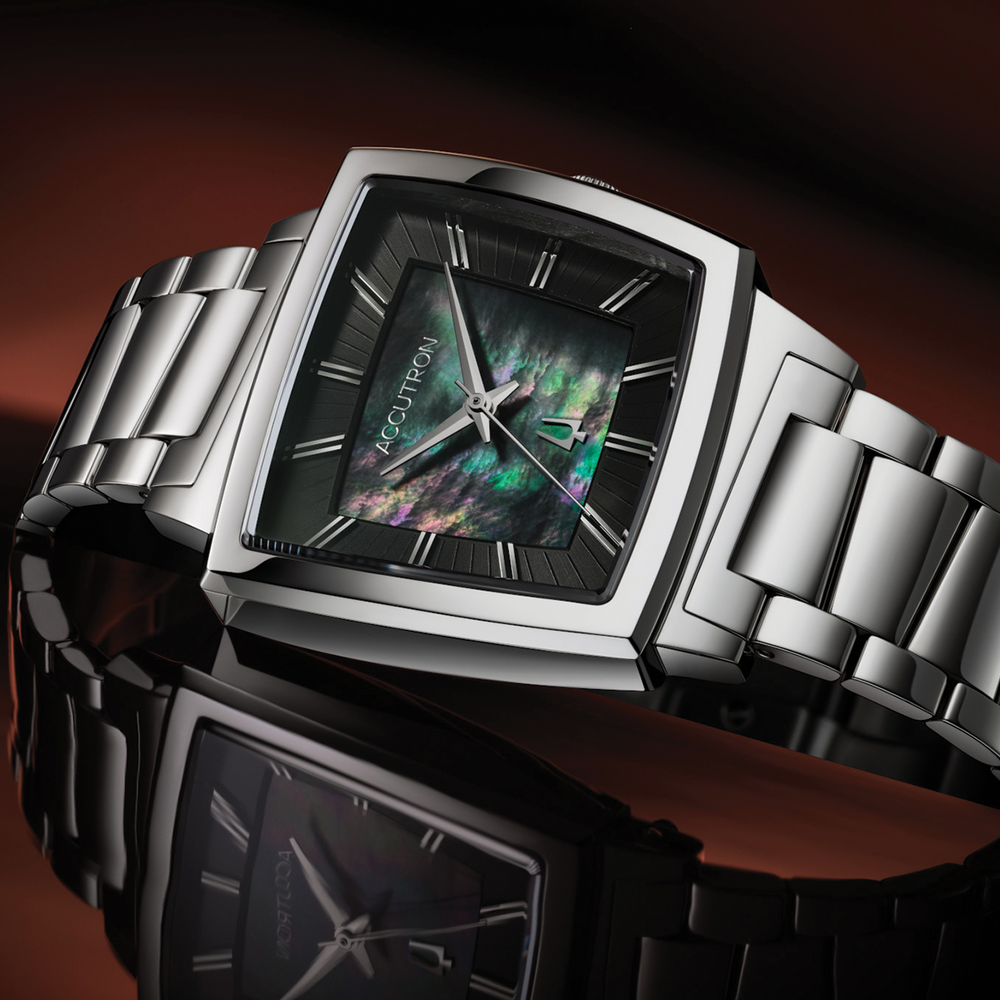 Accutron Memphis 521 square stainless steel watch with black dial and iridescent inner panel on a polished bracelet