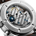 Close-up of the Longines Spirit Pilot Flyback movement visible through a sapphire case back with blue screws