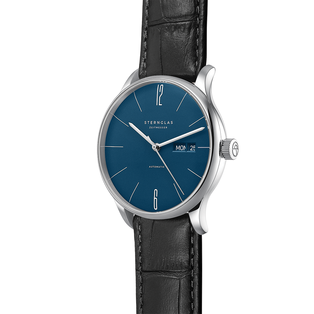 Close-up of Berlin Automatic 38mm blue dial watch on black textured leather strap