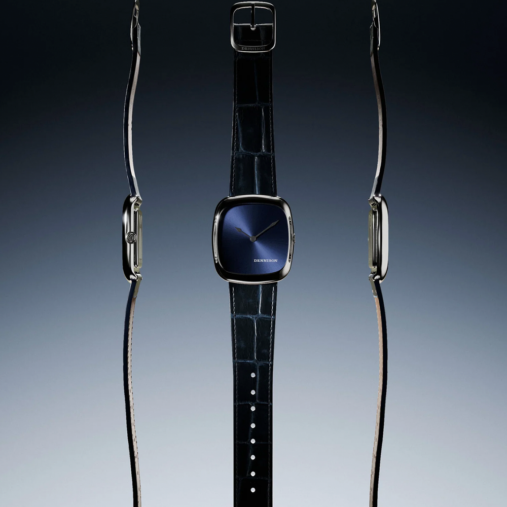 Three-view studio shot of blue sunray dial watch on a dark blue leather strap.