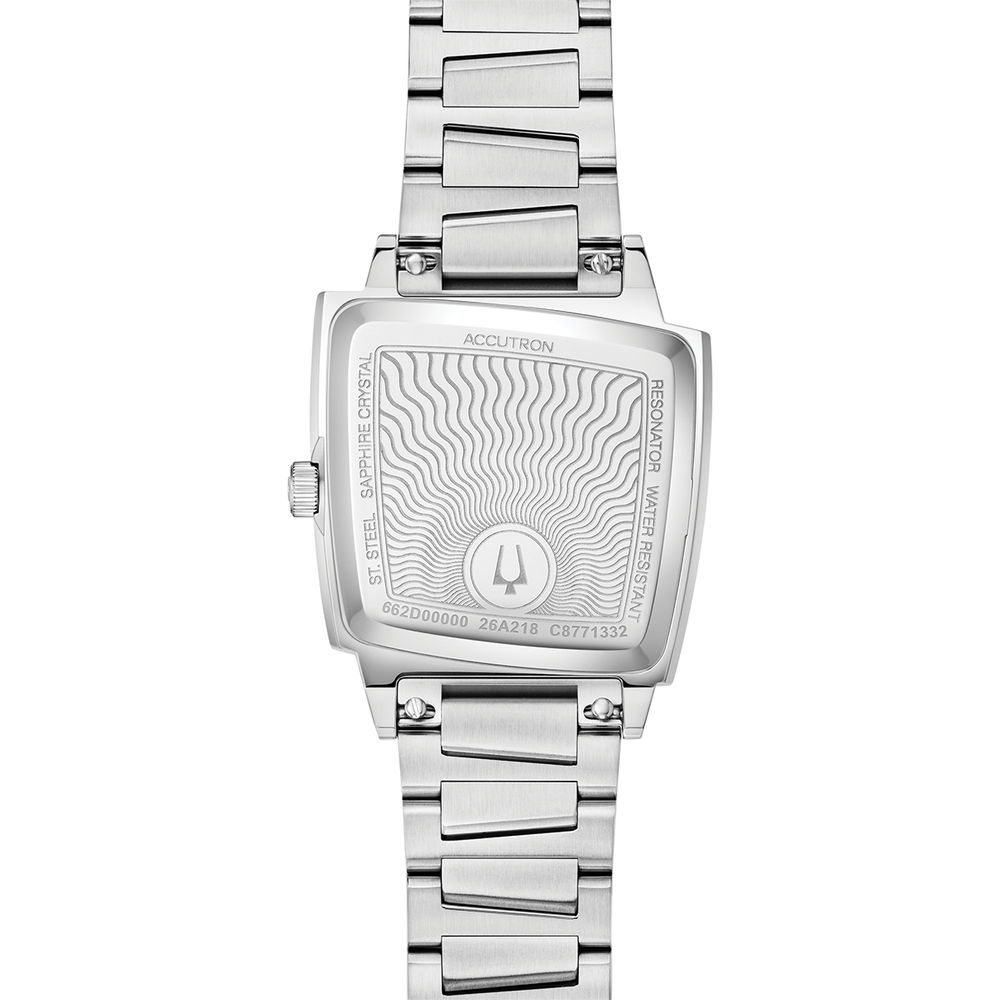 Back of Accutron Memphis 521 bracelet watch with wavy pattern case back and stainless steel bracelet