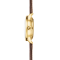 Side profile of a gold Berlin automatic watch with a brown leather strap and crown