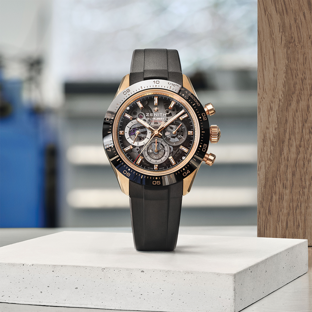 Chronomaster Sport Skeleton 18K rose gold 41mm with grey dial on grey rubber strap displayed on a pedestal