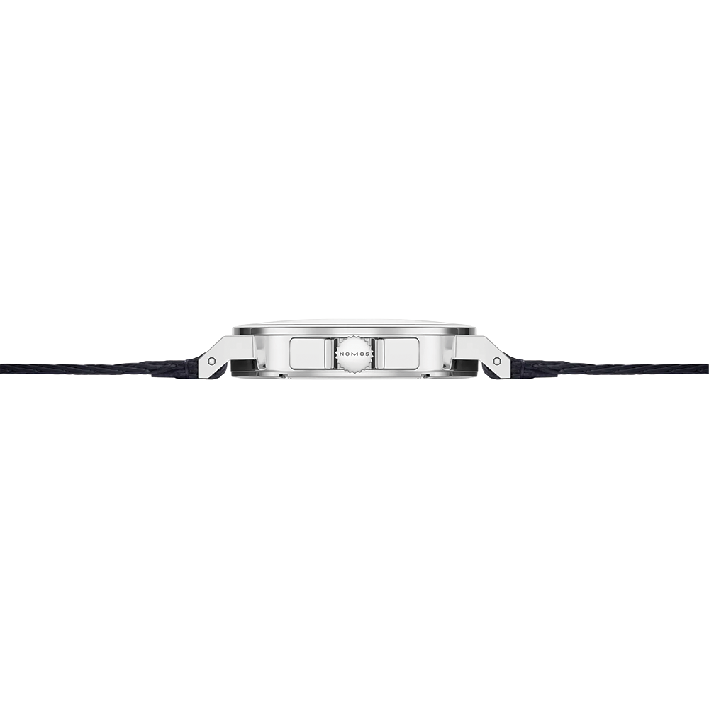 Side profile of Ahoi Neomatik Sky watch showing crown and blue fabric strap