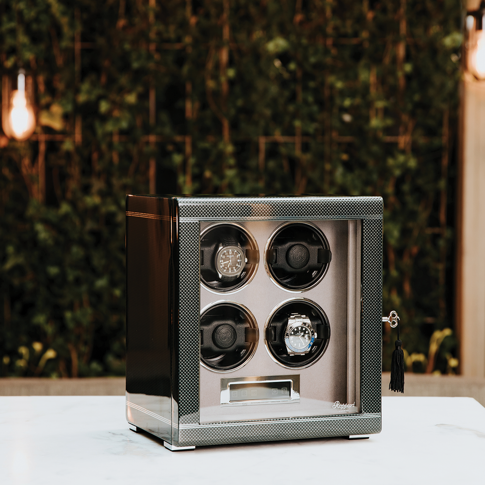 Formula Quad Watch Winder silver with four circular watch slots, glass front, and digital control panel