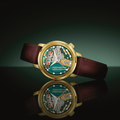 Angle view of a gold-tone Spaceview 314 Limited Edition watch with green dial and brown leather strap, reflected on a glossy surface.