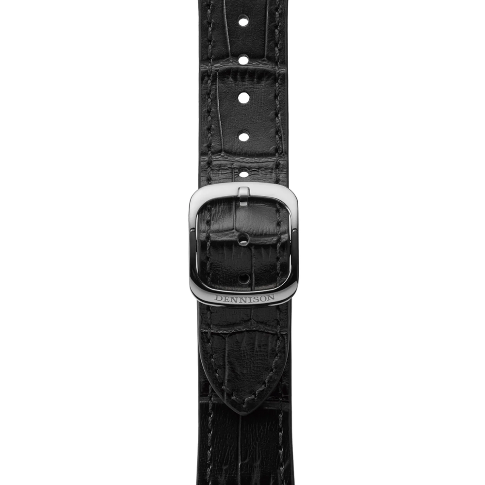 Close up of the black leather watch strap with a brushed metal buckle engraved Dennison