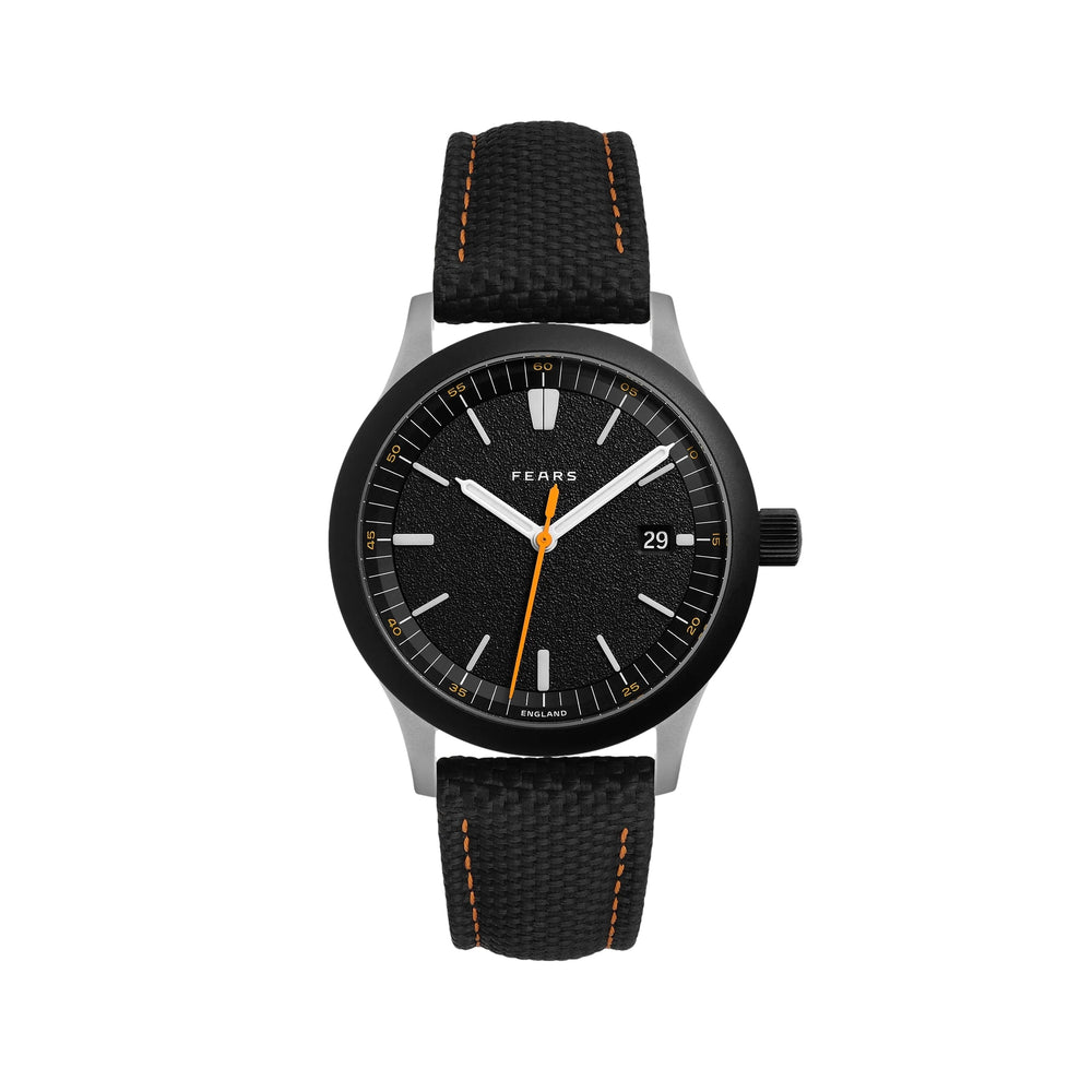 Close up of Redcliff 39.5 Date watch with black FKM rubber strap and orange stitching