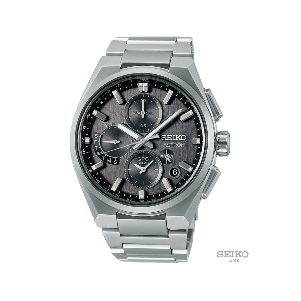 Seiko Astron 42mm grey watch on bracelet with multiple subdials and a date window
