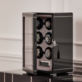 Formula Six Watch Winder in black carbon fiber finish with glass door open and six watches displayed inside