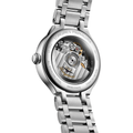Primaluna watch back with transparent case showing the movement and stainless steel bracelet.