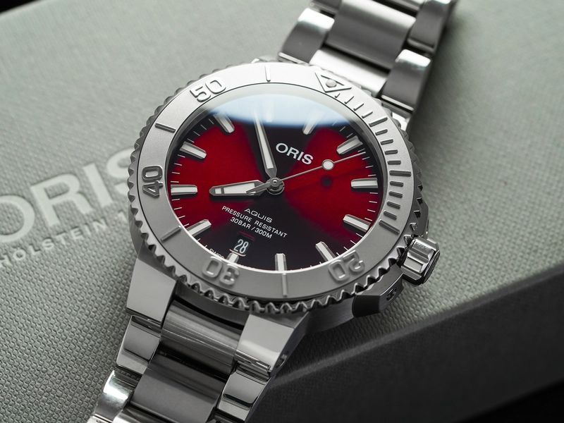 Aquis Date Cherry Dial Edition