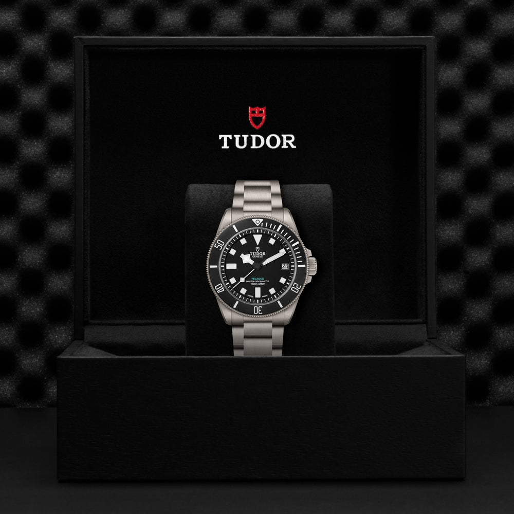Tudor Pelagos dive watch in a black presentation box with stainless steel bracelet